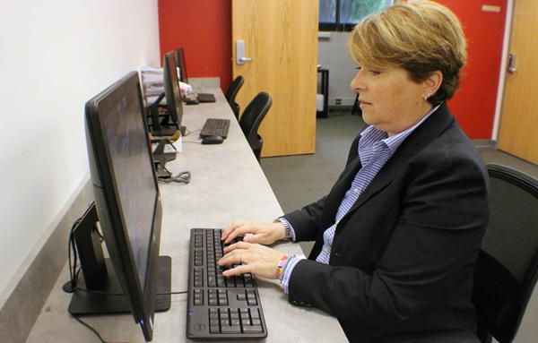 Graduate student working on a computer